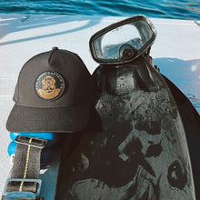 Load image into Gallery viewer, waterproof trucker hat with dive helmet logo