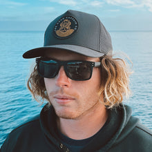 Load image into Gallery viewer, waterproof trucker hat with dive helmet logo