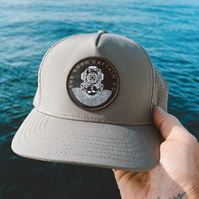 Load image into Gallery viewer, waterproof trucker hat with dive helmet logo